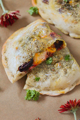 Beet, Pesto, Gouda, and Chicken Calzones